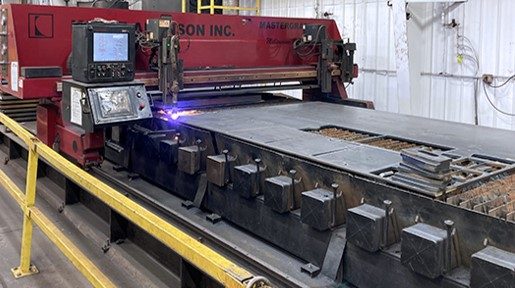 A CNC plasma cutting table working on steel plate